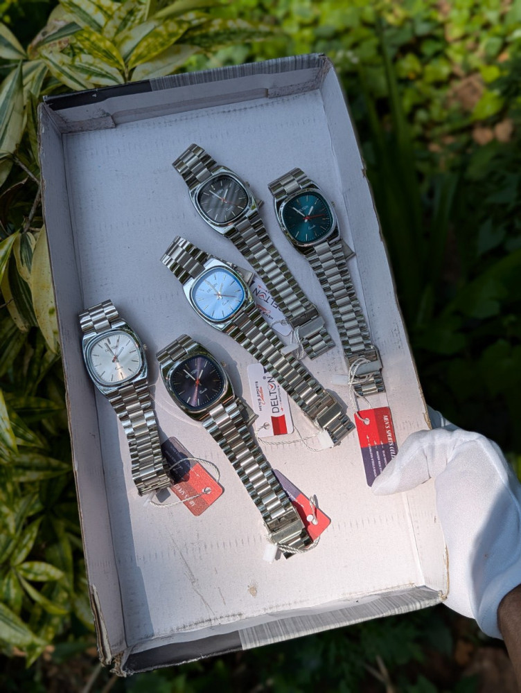 ✨ Elevate your wrist game with the Delton Premium Analog Chain Watch! ✨