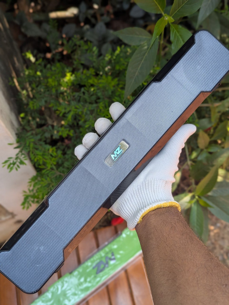 Elevate your home theater with the MZ M51 Wireless Soundbar