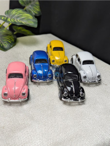 Cruise in classic style with this Volkswagen Beetle vintage 1:43 Scale metal car