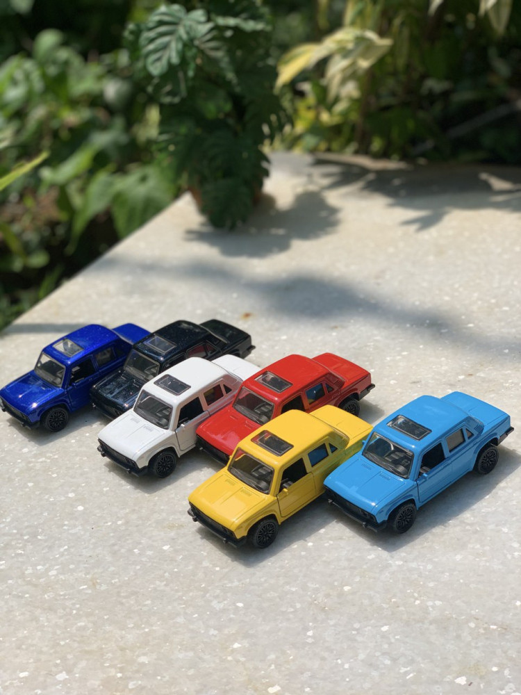 Add a touch of vintage charm with this 1:32 Scale Lada metal miniature