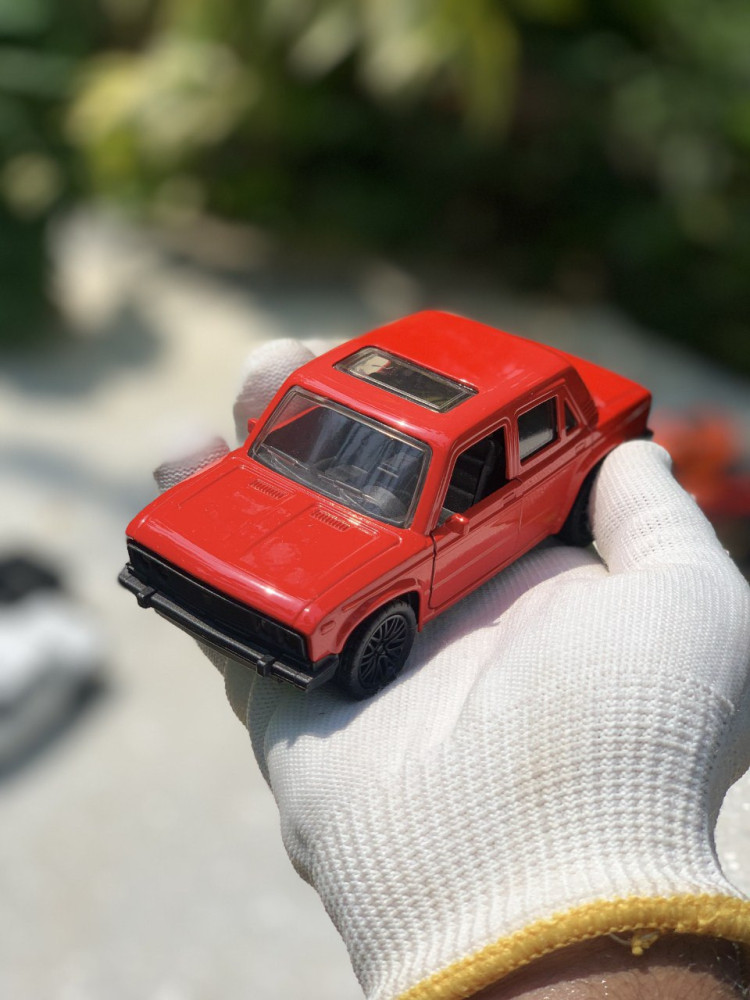 Add a touch of vintage charm with this 1:32 Scale Lada metal miniature
