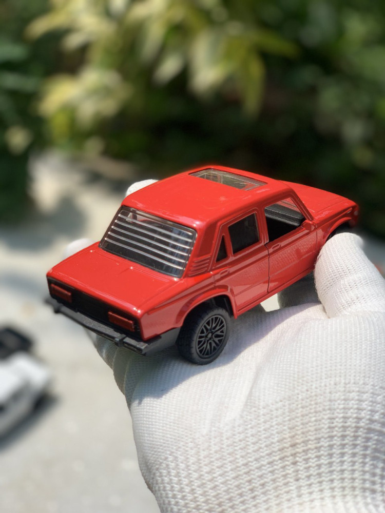 Add a touch of vintage charm with this 1:32 Scale Lada metal miniature
