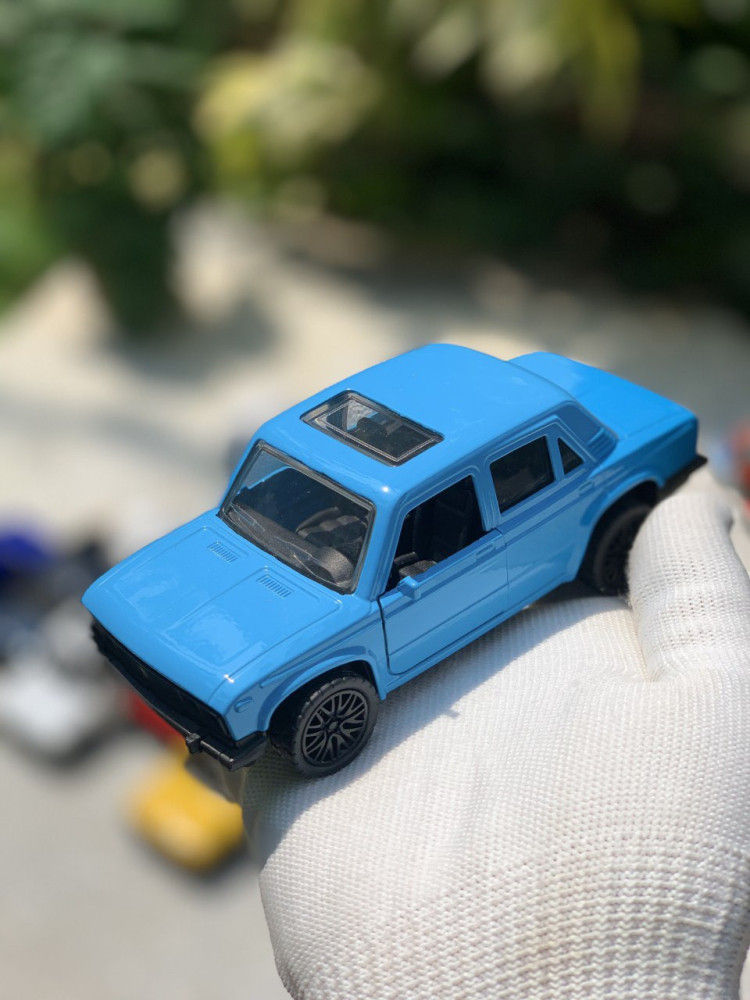 Add a touch of vintage charm with this 1:32 Scale Lada metal miniature