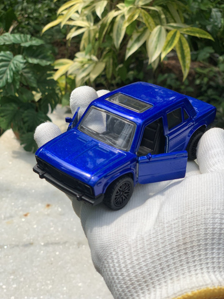 Add a touch of vintage charm with this 1:32 Scale Lada metal miniature