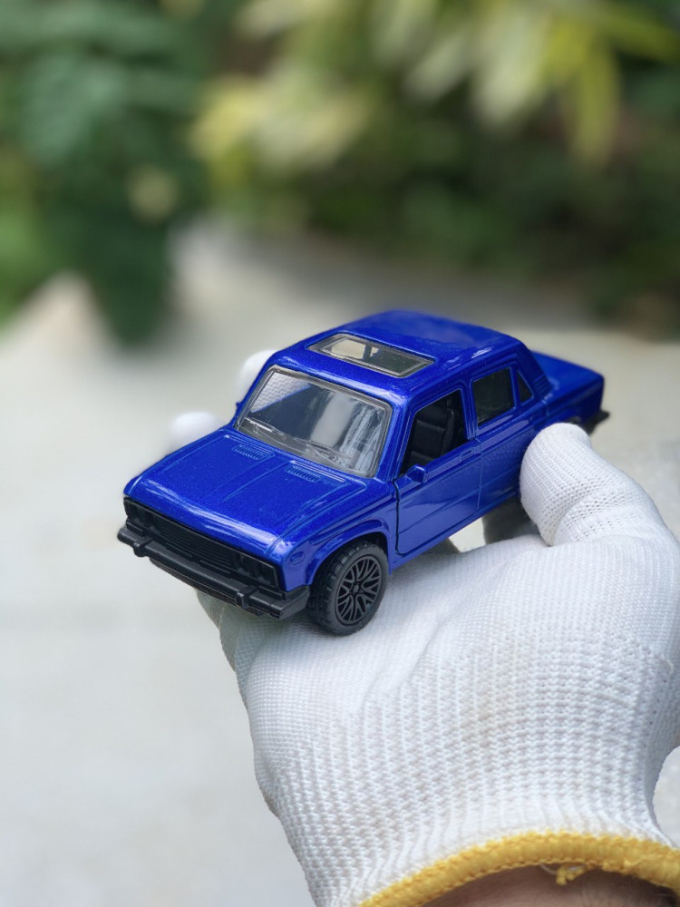 Add a touch of vintage charm with this 1:32 Scale Lada metal miniature