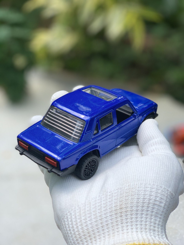 Add a touch of vintage charm with this 1:32 Scale Lada metal miniature