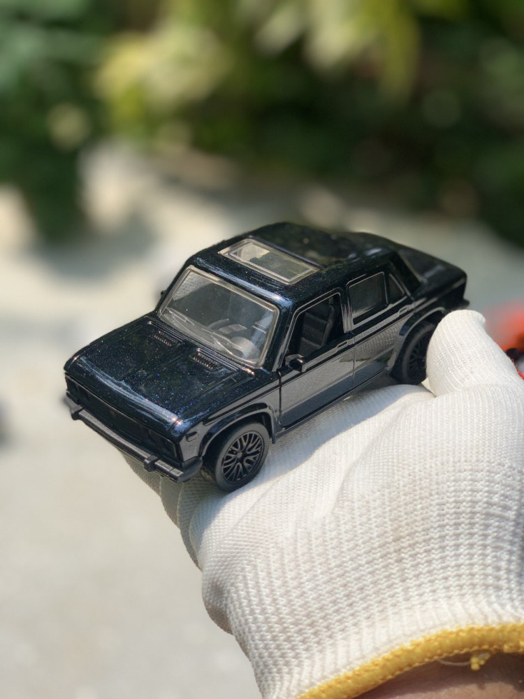Add a touch of vintage charm with this 1:32 Scale Lada metal miniature