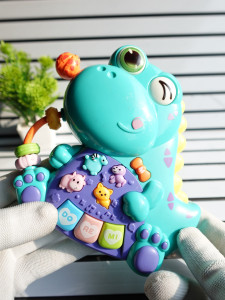 Musical Dinosaur Learning Toy – Sensory Rattle & Piano for Early Brain Development