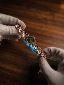 Elegant Rose Gold Floral Bracelet Watch with Emerald Green Dial